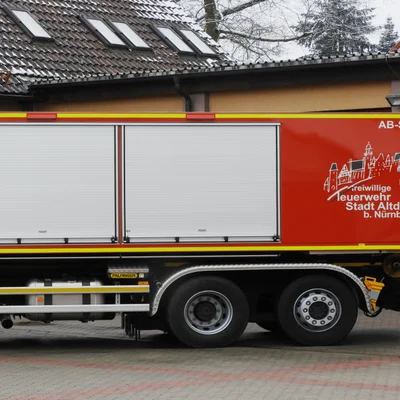 Abrollbehälter Schlauch